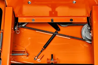 Top view of the interior mechanics of a Husqvarna ride-on mower.