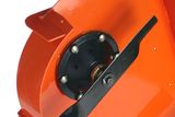 Close-up view of a lawn mower blade and deck assembly.