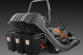 Rear view of a ride-on mower with a grass collection system.