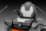 Front view of a Husqvarna ride-on mower seat with control handles.
