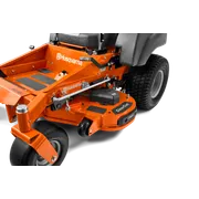Close-up view of a Husqvarna commercial front mower with cutting deck.