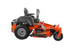 Side view of a Husqvarna ride-on mower with cutting deck.