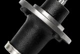 Top view of a metal spindle assembly component, showcasing its intricate design.