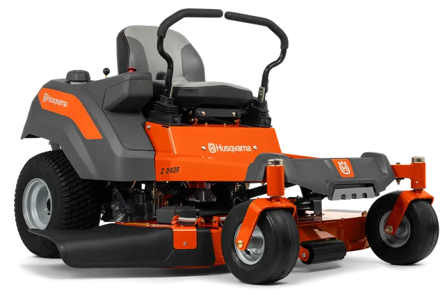 Вид збоку на косарку-трактор Husqvarna з різальною декою.