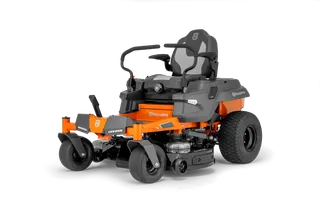 Side view of a Husqvarna ride-on mower with cutting deck.