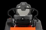 Rear view of a Husqvarna ride-on mower seat with armrests.