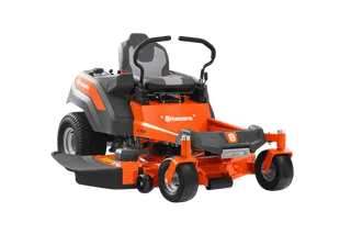 Side view of a Husqvarna zero-turn mower with cutting deck.