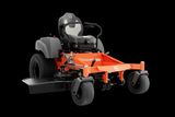 Front view of a Husqvarna zero-turn ride-on mower with a cutting deck.