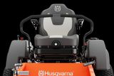 Front view of a Husqvarna ride-on mower seat and steering wheel.