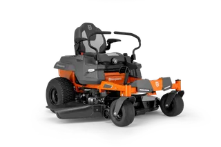 Side view of a Husqvarna ride-on mower with visible seat and steering handles.