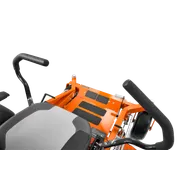 Top view of a ride-on mower's control area with steering levers and seat.