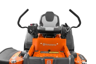 Front view of a Husqvarna ride-on mower showcasing the seat and control handles.