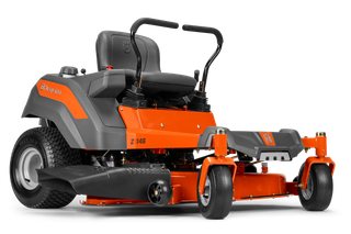 Side view of a Husqvarna ride-on mower with cutting deck.