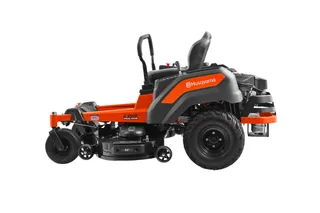 Side view of a Husqvarna zero-turn ride-on mower.