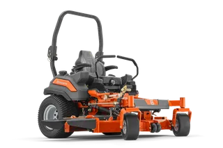 Side view of a Husqvarna zero-turn ride-on mower with cutting deck.