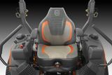 Front view of a Husqvarna ride-on mower seat with armrests and control levers.