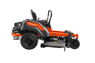 Side view of a Husqvarna zero-turn mower showcasing its design and cutting deck.