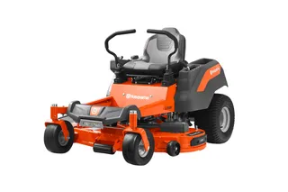 Side view of a Husqvarna zero-turn ride-on mower.