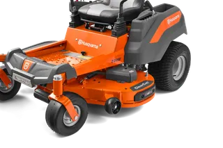 Side view of a Husqvarna commercial front mower with cutting deck.