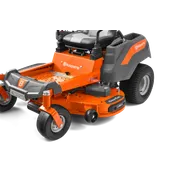 Side view of a Husqvarna commercial front mower with cutting deck.