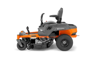 Side view of a Husqvarna ride-on mower showcasing its cutting deck.