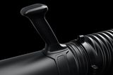 Close-up of a handle on a piece of equipment, showcasing its ergonomic design.