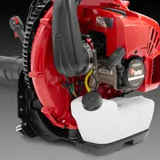 Side view of a backpack leaf blower showcasing its engine and fuel tank.