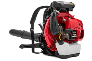 Side view of a backpack leaf blower with visible engine components.