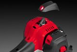Top view of a power tool with a removable cover, showcasing its engine compartment.