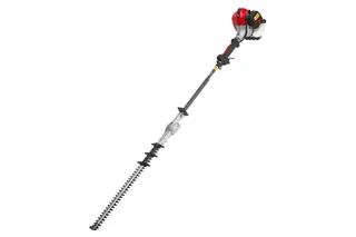 Side view of a pole hedge trimmer with an extended cutting blade.