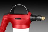 Close-up view of a nozzle attachment for a spray gun.