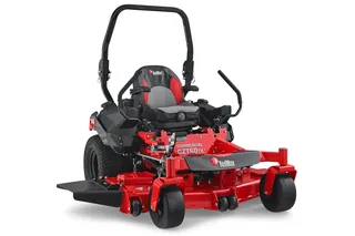 Front view of a RedMax commercial zero-turn mower with cutting deck.