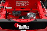 Close-up view of a RedMax commercial CZT60+ mower deck showing pulleys and belts.
