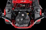 Top view of a commercial front mower engine compartment showcasing various components.