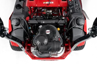 Top view of a commercial front mower engine compartment showcasing various components.